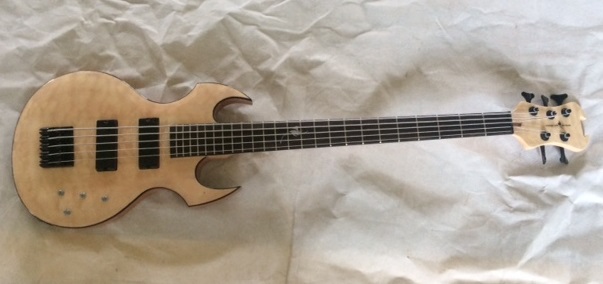 Custom 5-string Bass by Fireplant Guitars with black body binding.
