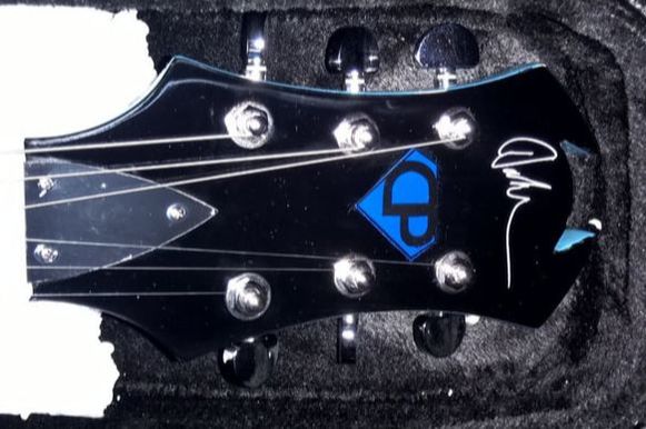 Custom Electric Guitar with Logo and Signature on Headstock
